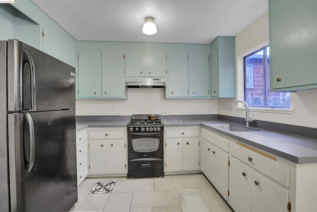 kitchen with black appliances, light tile patterned floors, and sink