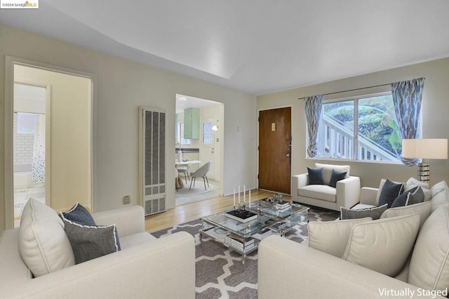 living room with hardwood / wood-style flooring