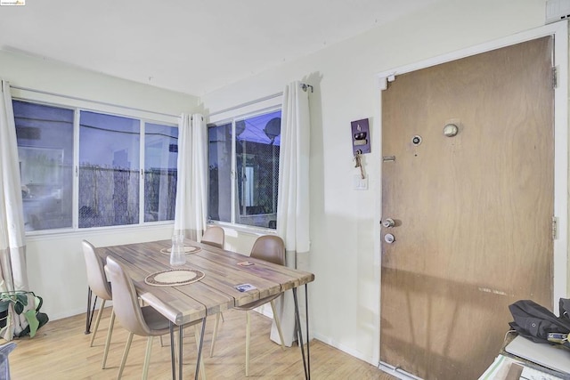 dining area with light hardwood / wood-style flooring