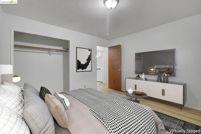 bedroom featuring light wood-type flooring and a closet