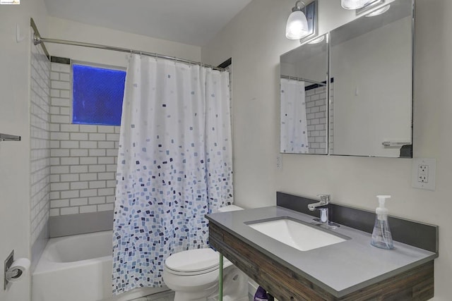 full bathroom featuring vanity, shower / bathtub combination with curtain, and toilet