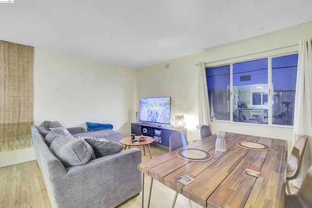 living room featuring light wood-type flooring