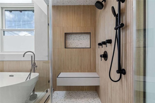 bathroom featuring sink and plus walk in shower