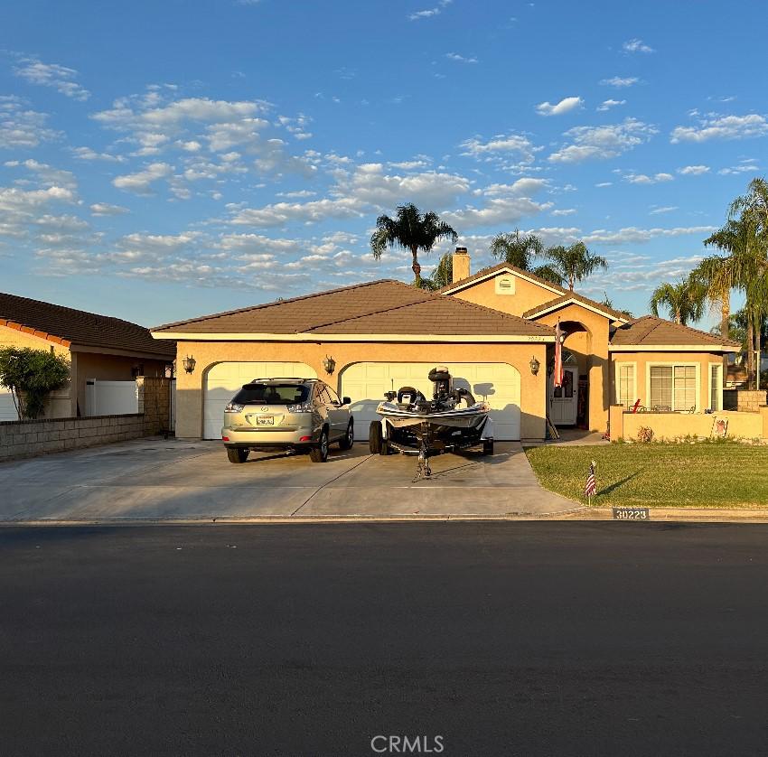 single story home with a garage