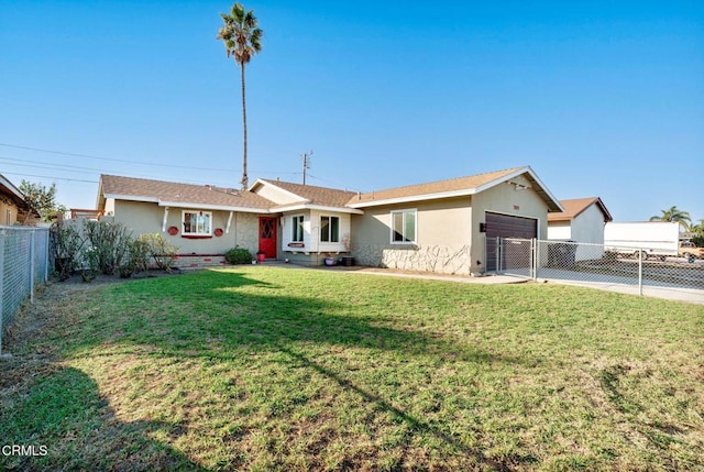 ranch-style home with a garage and a front lawn