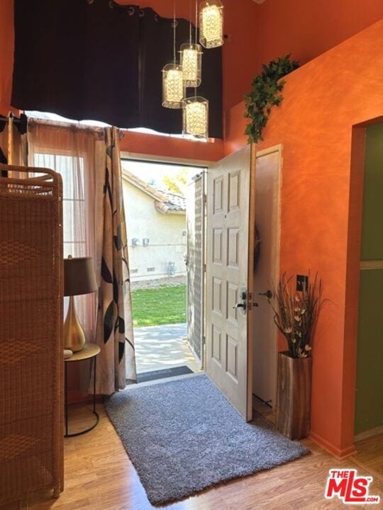 entrance foyer with hardwood / wood-style floors