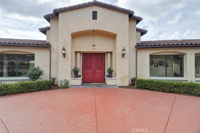1450 Sugar Bush Ct, Arroyo Grande, CA 93420 - doorway to property featuring a tiled roof and stucco siding