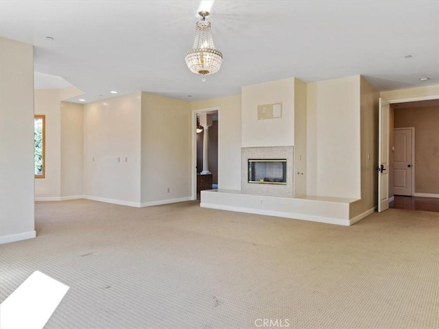 unfurnished living room with light colored carpet