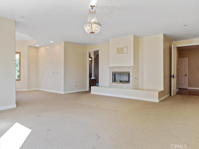1450 Sugar Bush Ct, Arroyo Grande, CA 93420 - unfurnished living room featuring light carpet, a premium fireplace, baseboards, and recessed lighting