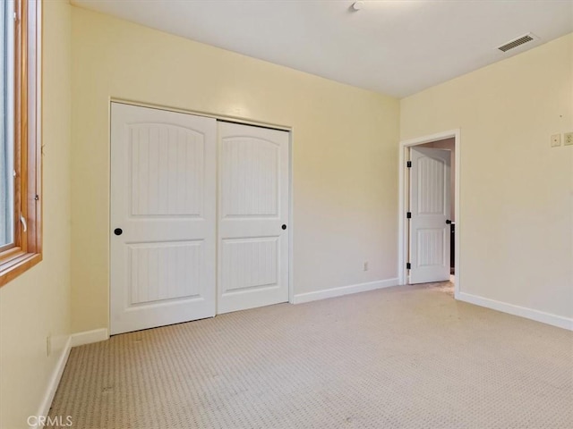 1450 Sugar Bush Ct, Arroyo Grande, CA 93420 - unfurnished bedroom featuring a closet, light carpet, and baseboards