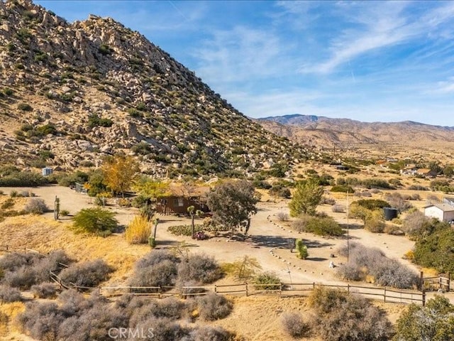 mountain view featuring a rural view