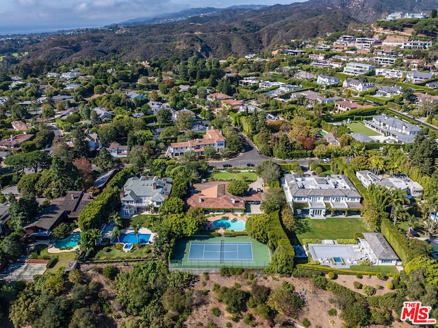 drone / aerial view featuring a mountain view