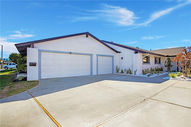 ranch-style home featuring a garage