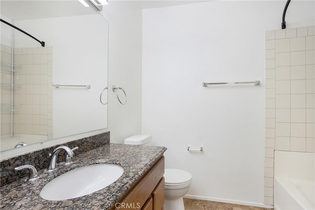 full bathroom with vanity, toilet, and tiled shower / bath combo