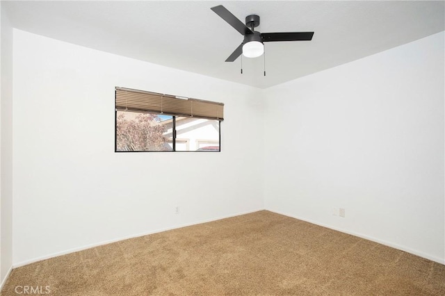 carpeted empty room with ceiling fan