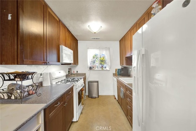 kitchen featuring white appliances