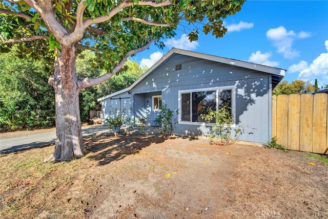 view of front of home with fence