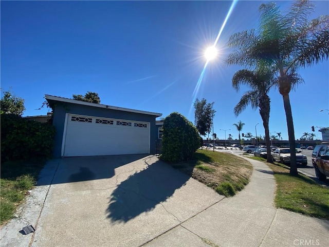 view of property exterior with a garage