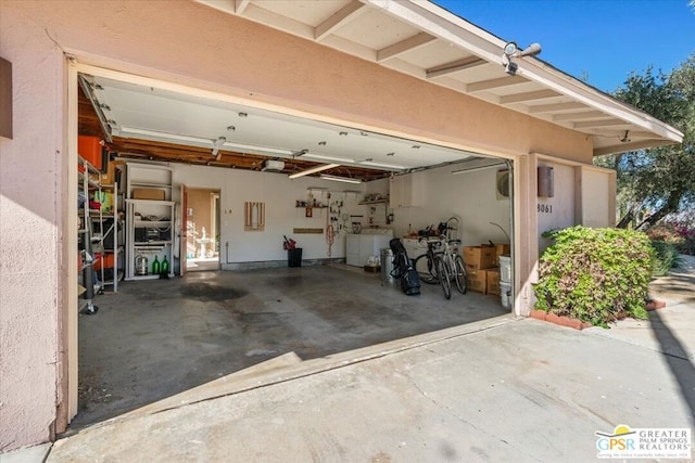 garage with separate washer and dryer