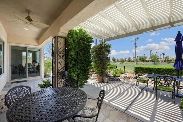 view of patio / terrace featuring a pergola and ceiling fan