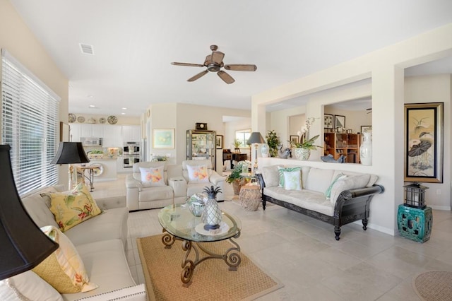 living room with ceiling fan