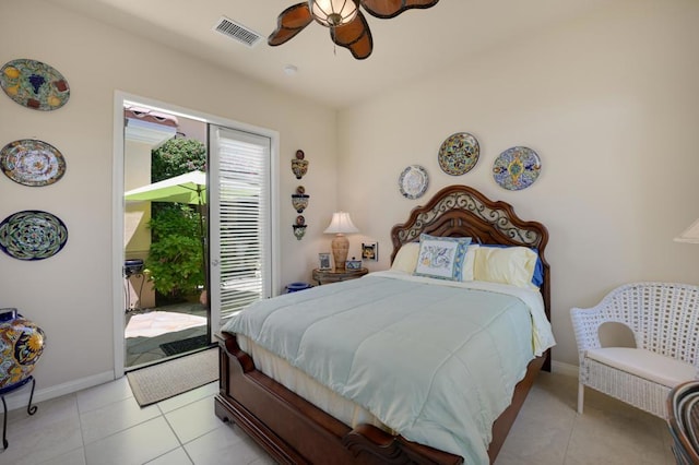 tiled bedroom with ceiling fan and access to exterior