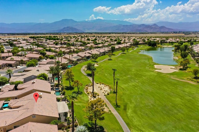 bird's eye view with a water and mountain view