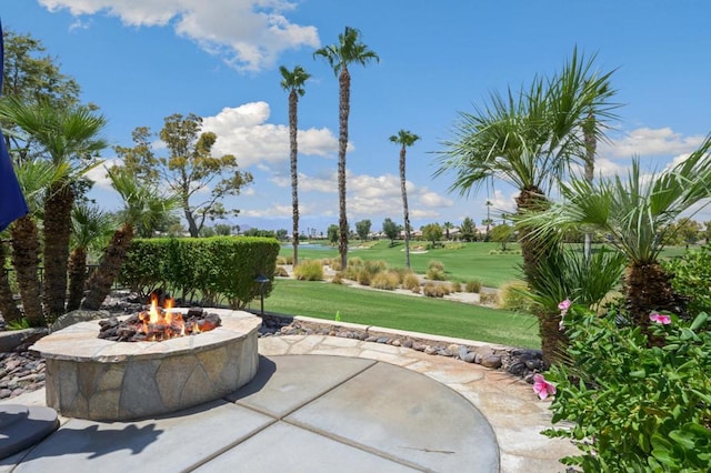 view of patio with an outdoor fire pit