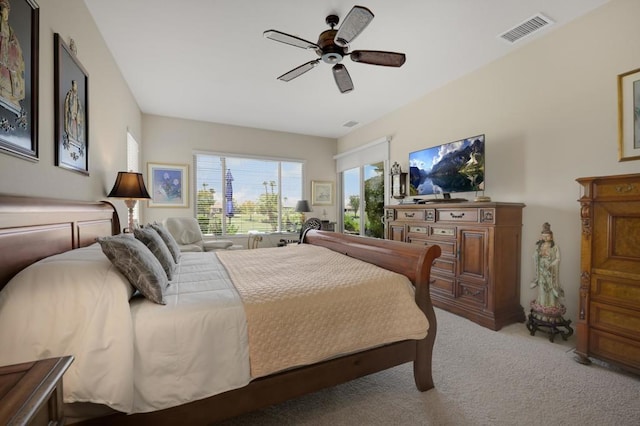 bedroom with light colored carpet and ceiling fan