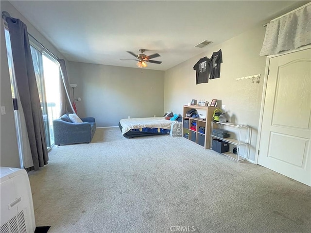 bedroom featuring carpet and ceiling fan