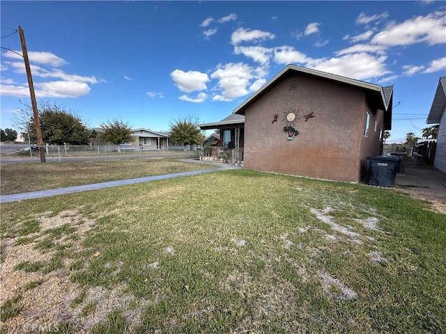 exterior space with a yard