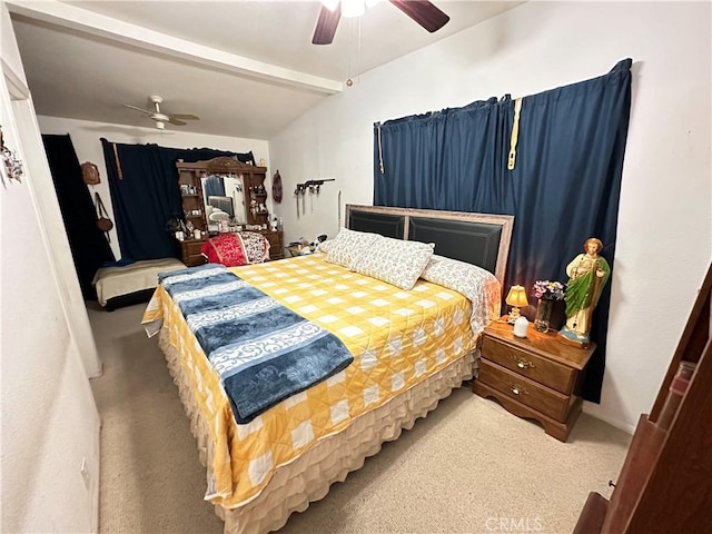 bedroom with carpet, vaulted ceiling, and ceiling fan