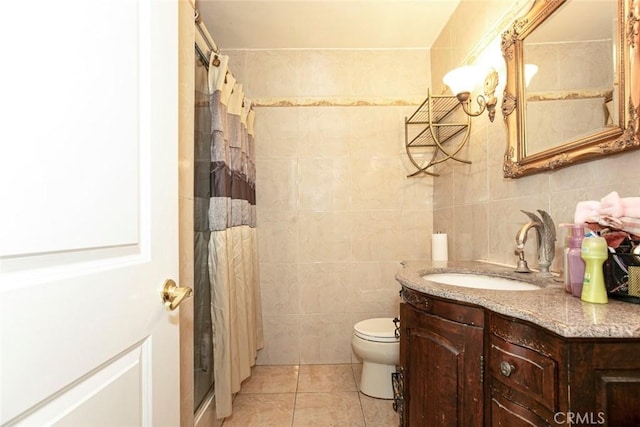 bathroom featuring tile patterned flooring, vanity, tile walls, and a shower with shower curtain