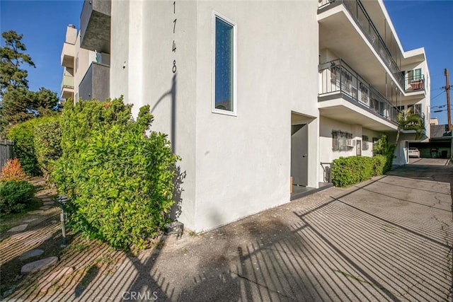 1748 N Kenmore Ave Unit 203, Los Angeles, CA 90027 - view of property exterior with stucco siding