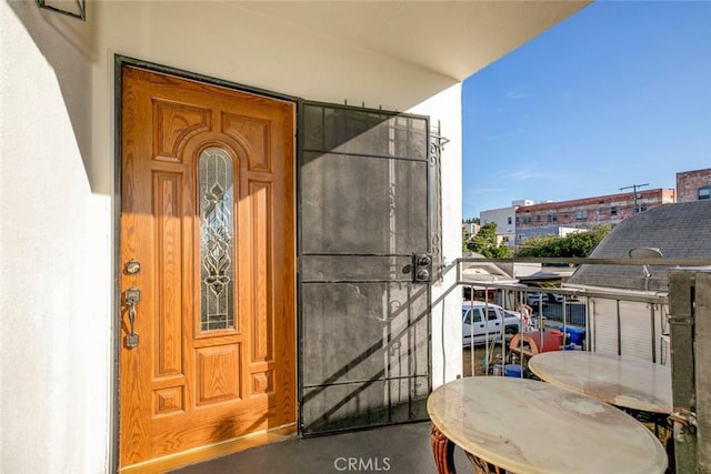 1748 N Kenmore Ave Unit 203, Los Angeles, CA 90027 - entrance to property with stucco siding and a balcony