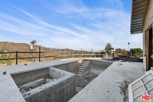 view of patio with a mountain view