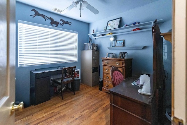 office space with ceiling fan and hardwood / wood-style flooring