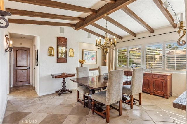 dining area featuring a notable chandelier and vaulted ceiling with beams