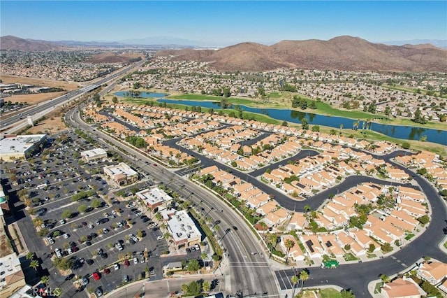 bird's eye view featuring a water and mountain view