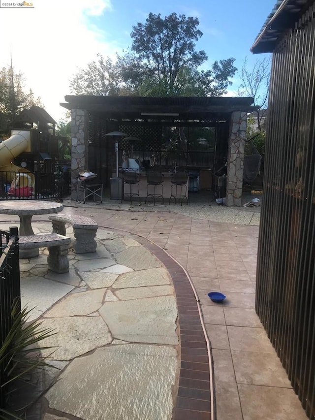 view of patio / terrace featuring a playground