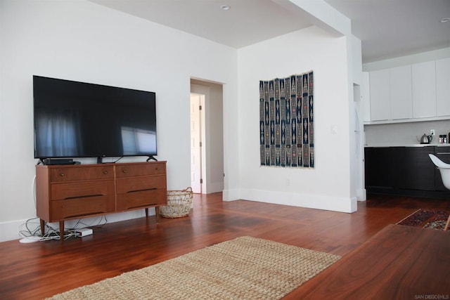 living room featuring dark hardwood / wood-style floors