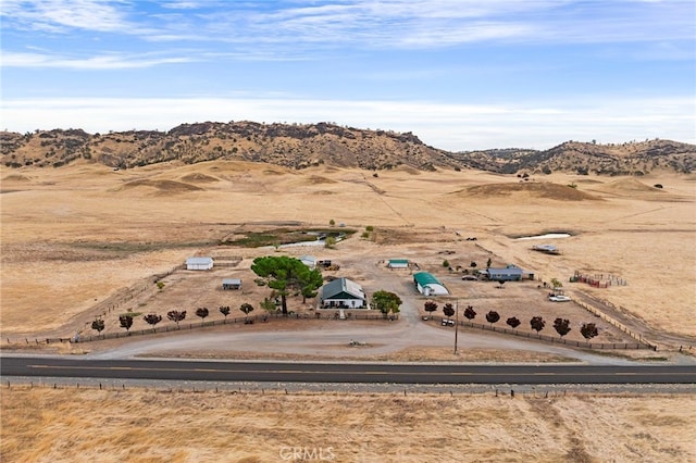 bird's eye view featuring a rural view and a mountain view