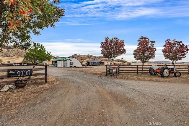 view of street featuring a rural view