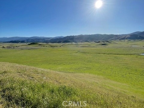 view of mountain feature with a rural view