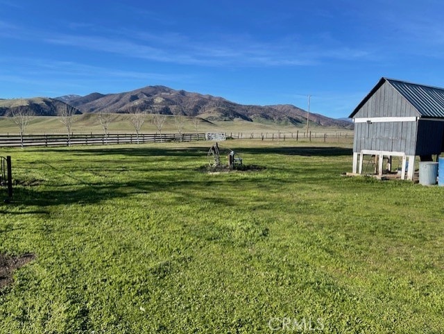 view of mountain feature with a rural view