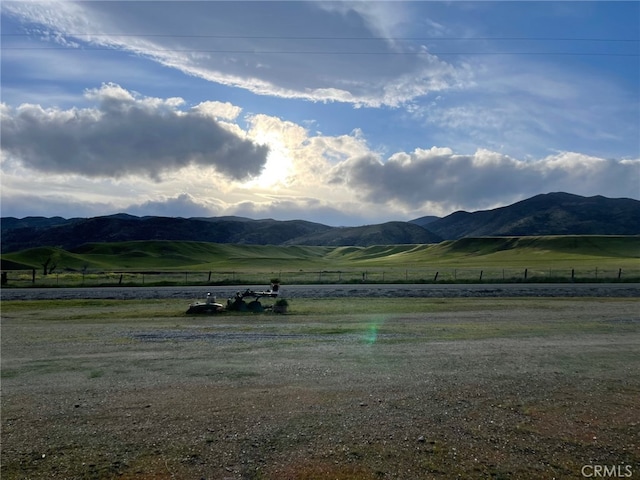 property view of mountains featuring a rural view