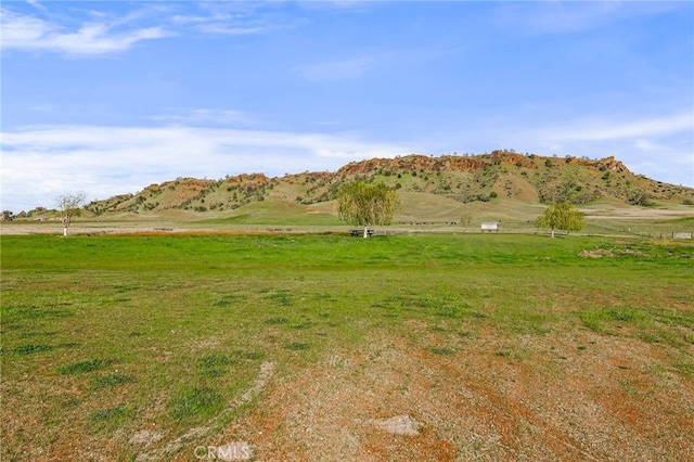 property view of mountains featuring a rural view