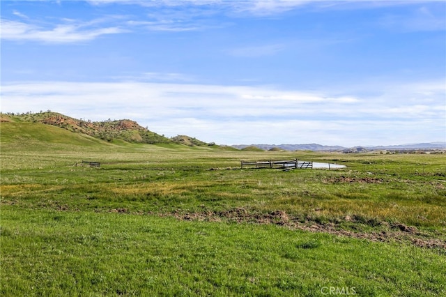 exterior space featuring a rural view and a mountain view