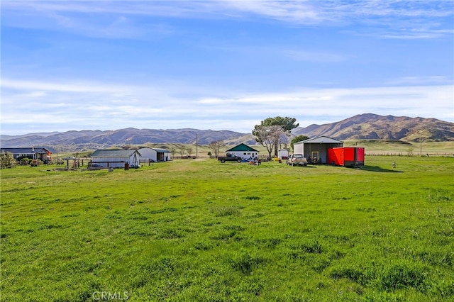 property view of mountains featuring a rural view
