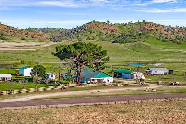 drone / aerial view with a rural view and a mountain view
